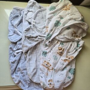 Three velcro swaddles
